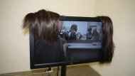 Shopping With Family, 2013, TV, Media- Player, Wigs, Heaadphones, 153 x 90 x 30 cm